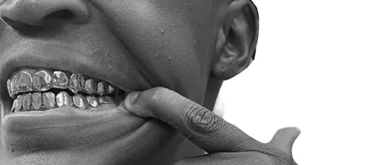 The Iconic Style of Rappers and Their Grills - The Trini Gee