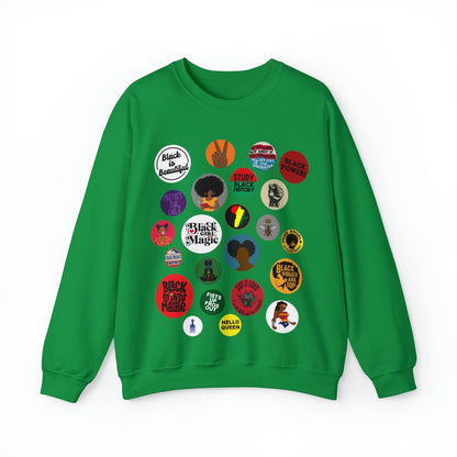 Sweatshirt with button-style designs celebrating Black culture, featuring phrases, symbols, and illustrations in a grid.