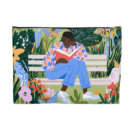 Woman Reading on Bench Accessory Pouch - Afrocentric Art by The Trini Gee