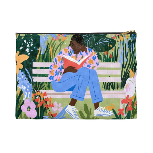 Woman Reading on Bench Accessory Pouch - Afrocentric Art by The Trini Gee