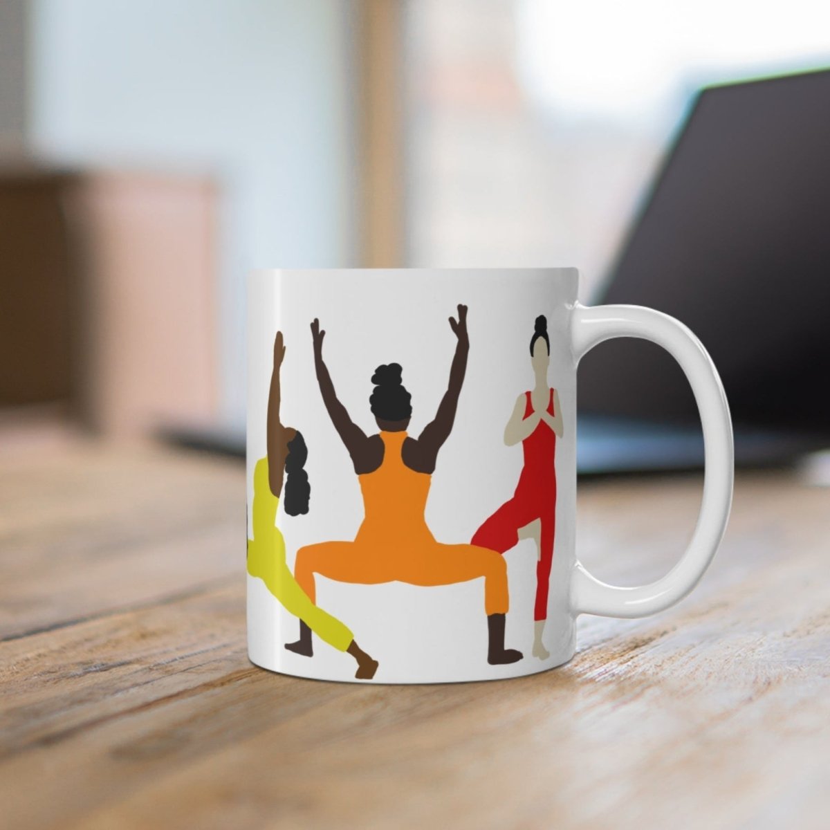 Mug with brown women of different shades doing various yoga poses while wearing chakras colors.